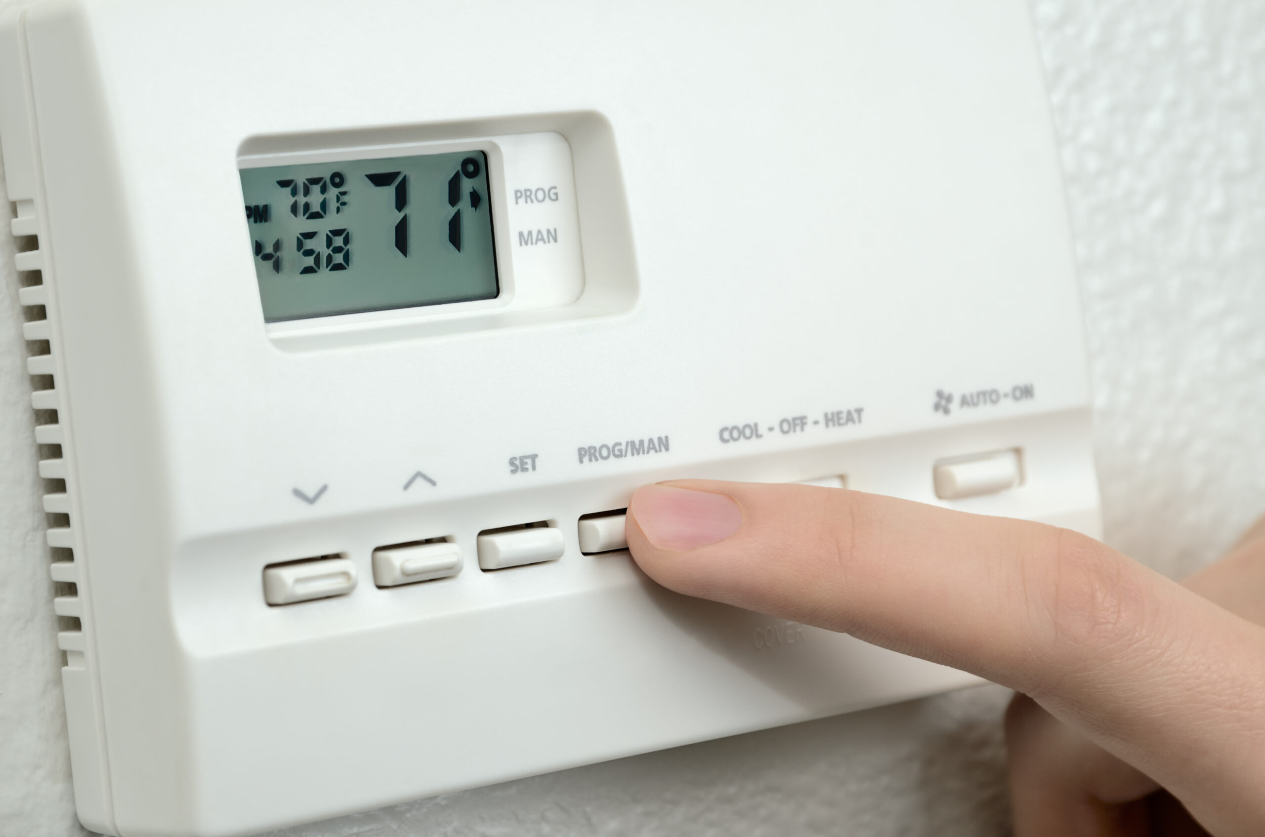Finger,Pressing,Button,On,Digital,Thermostat, Staying Cool, In Summer, AC, Cool Air, Rental Home